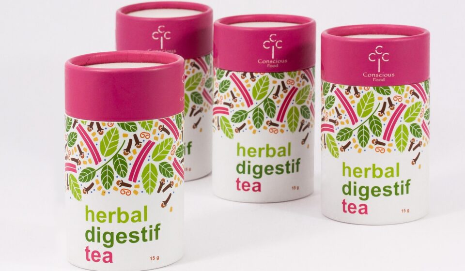 tea, packaging, herbal tea, digestive tea, food, drink, nourishment, deliberately, mindful, health, mint leaves, clove, licorice, cinnamon, cylinder, carton, green, dark red, layout, pack design, cylinder, cylinder, cylinder, cylinder, cylinder