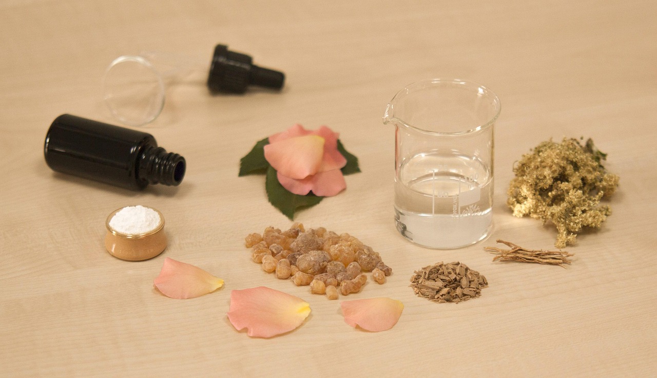 creating perfume, natural perfume, fragrance, beaker, frankincense olibanum resin, olibanum, frankincense, santalum album, indian sandalwood, meadowsweet, filipendula ulmaria, chrysopogon zizanioides, vetiver, rose petals, top note, middle note, base note, magnesium carbonate, magnesia alba, ethyl alcohol, glass filter funnel, laboratory funnel, pasteur glass pipette, glass dropper, glass pipette, miron violet glass, cosmetic bottle, diy, skin care, skincare, aromatherapy, essential oils, brown bottle, brown laboratory, brown care, brown note, frankincense, frankincense, frankincense, frankincense, frankincense, skincare
